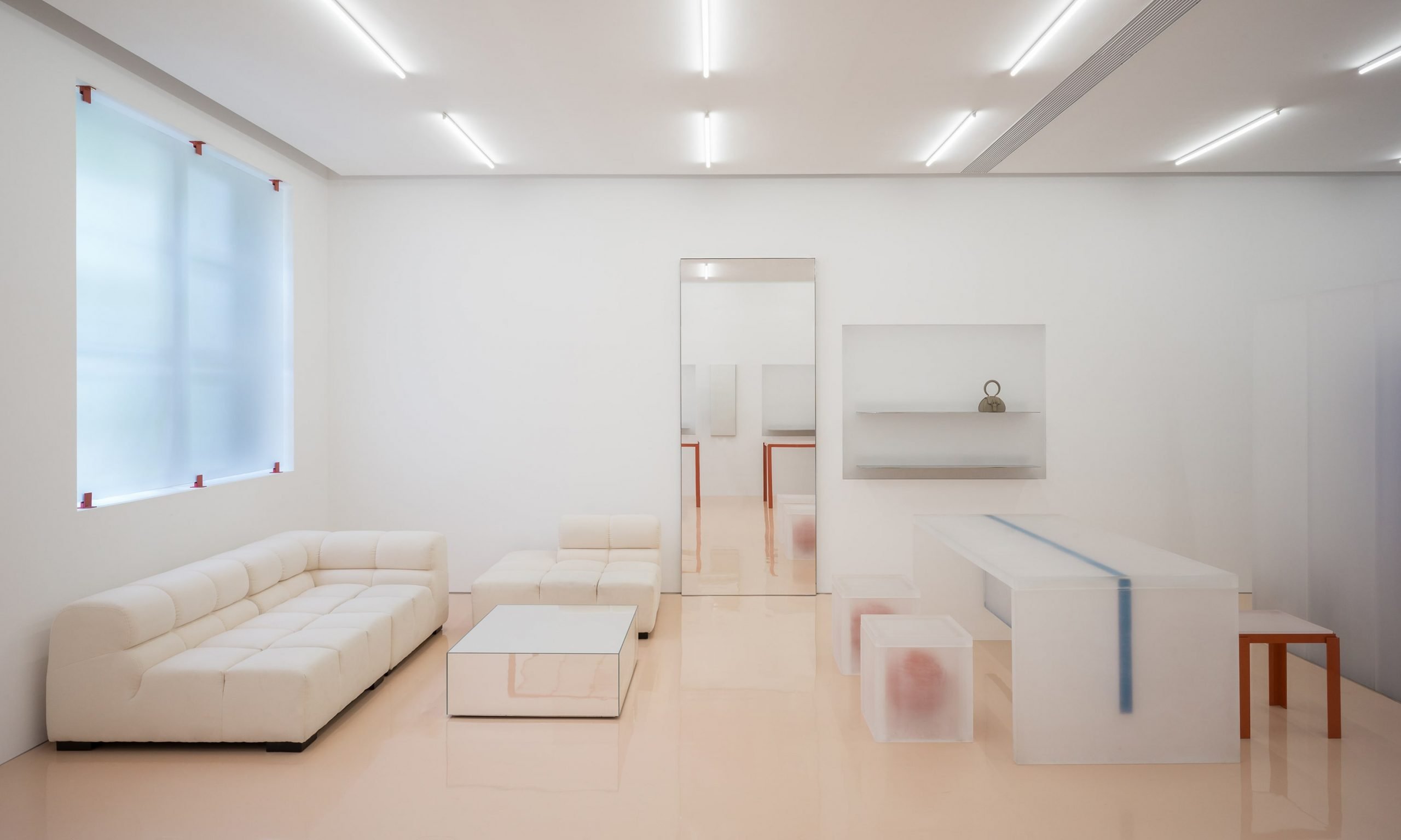 say-architects-envelops-minimalist-boutique-lika-lab-in-milky-resin-–