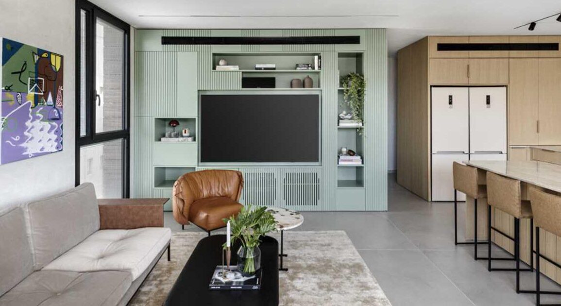 the-tv-fits-perfectly-into-this-custom-designed-living-room-wall