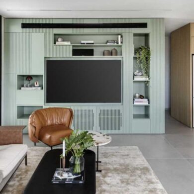 the-tv-fits-perfectly-into-this-custom-designed-living-room-wall