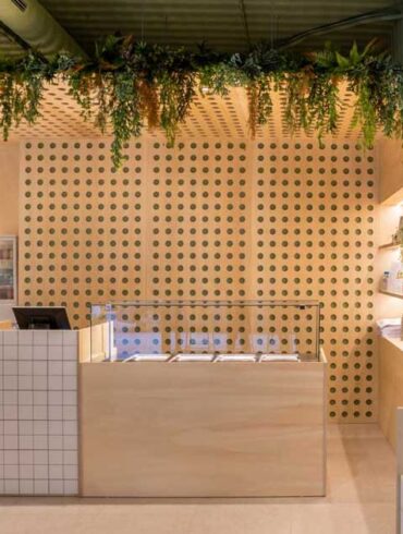 wood,-plants,-and-geometric-patterns-create-the-design-character-of-this-takeaway-shop