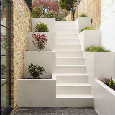 stairs-with-built-in-planters-lead-to-the-back-garden-at-this-home