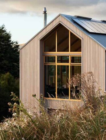 the-woody-palette-of-the-exterior-is-brought-through-to-the-inside-of-this-home-in-new-zealand