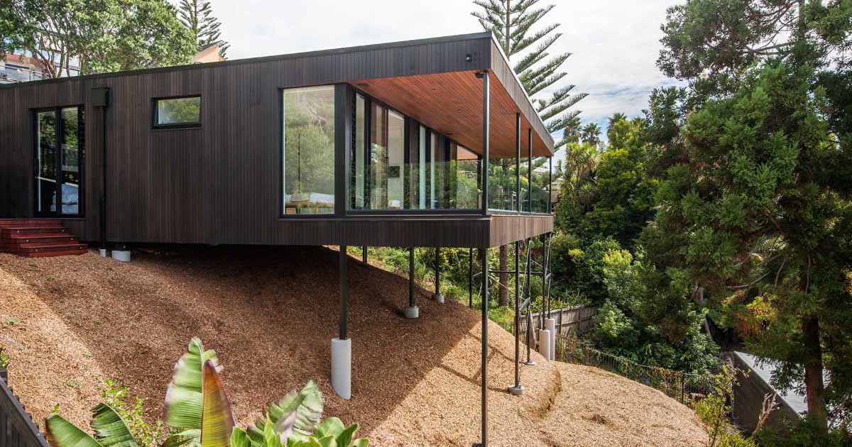 a-pier-foundation-allowed-this-home-to-be-built-on-a-steeply-sloped-property