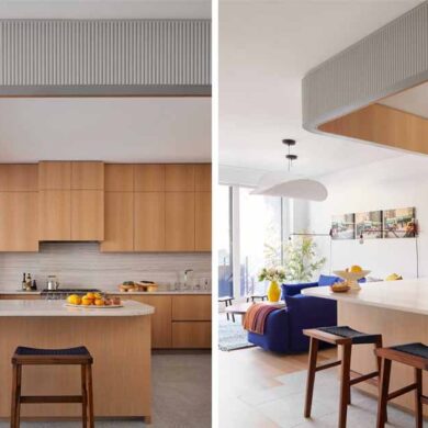 a-kitchen-wrapped-in-textured-wood-defines-the-boundary-of-the-workspace