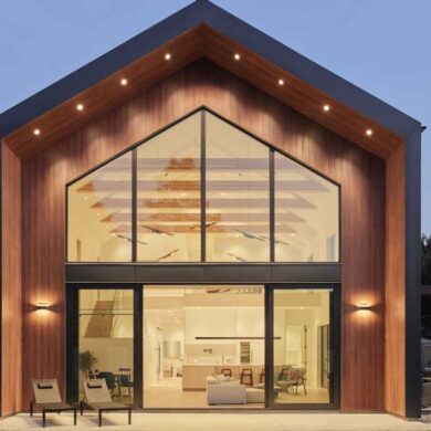 a-vaulted-ceiling-is-a-dramatic-feature-inside-this-modern-barn-house