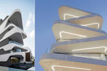 lighting-highlights-the-alternating-curvilinear-balconies-of-this-new-apartment-building