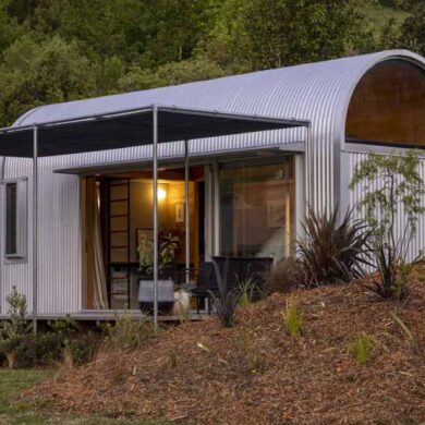 corrugated-metal-covers-the-barrel-shaped-roofs-of-this-portable-home