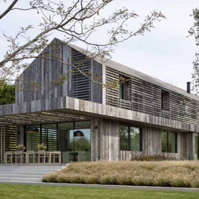 reclaimed-weathered-wood-siding-covers-this-home-inspired-by-farm-buildings