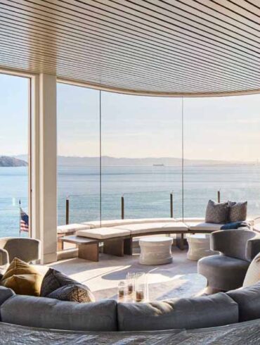 curved-windows-allow-this-home-to-have-unobstructed-water-views