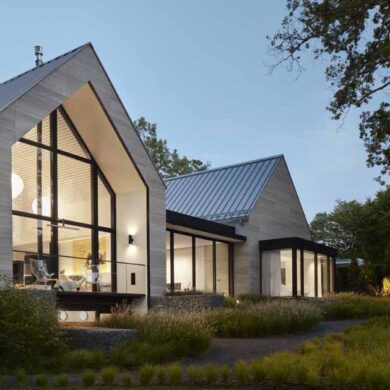 a-new-home-with-twin-gables-connected-by-a-glazed-breezeway