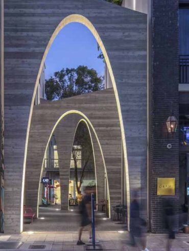 this-alley-between-buildings-was-transformed-with-a-series-of-arches