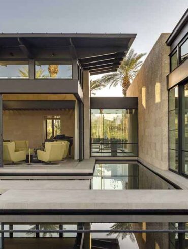 reflecting-ponds-and-concrete-lily-pads-help-create-tranquility-at-this-modern-home