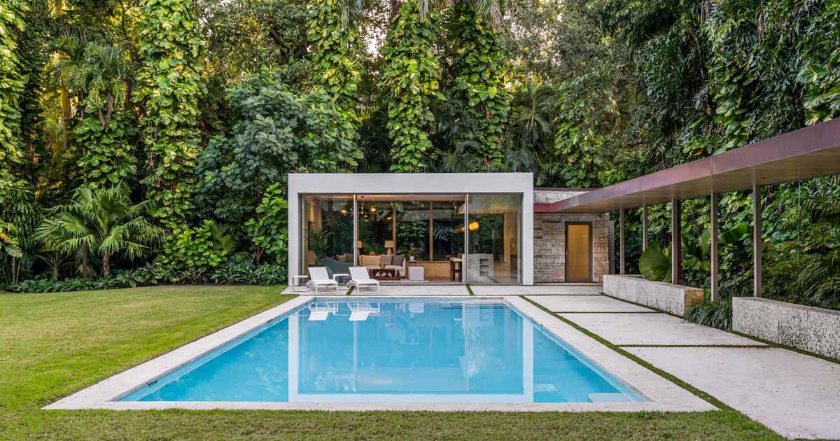 a-pool-house-and-loggia-enhance-this-lush-backyard-experience