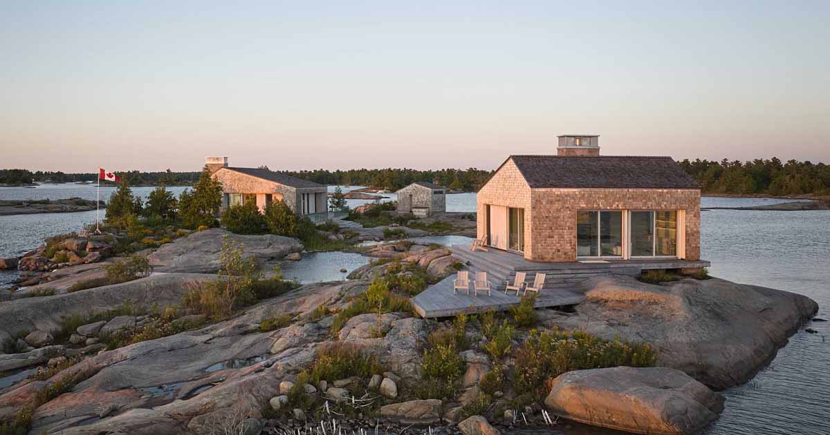 a-cluster-of-shingle-clad-buildings-create-an-island-cottage-experience-for-these-owners