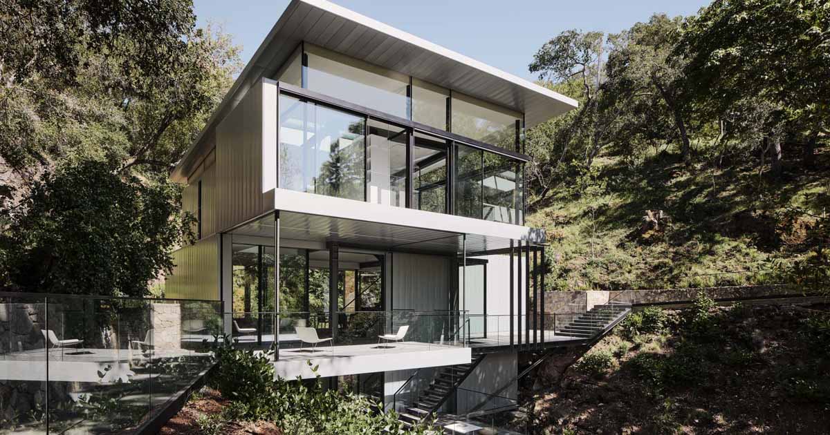 this-modern-home-is-suspended-over-a-creek