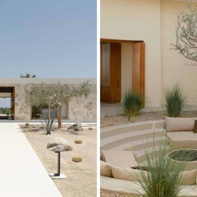 a-stone-covered-home-that-surrounds-a-central-courtyard-with-sunken-seating